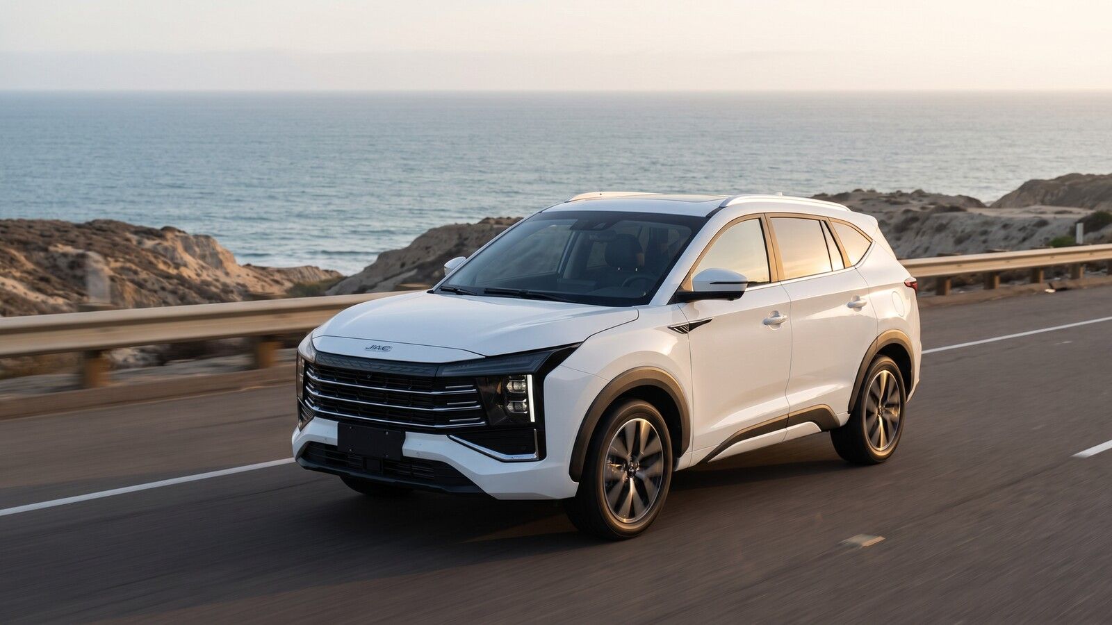 JAC Sei4 Pro on a coastal road at sunset.