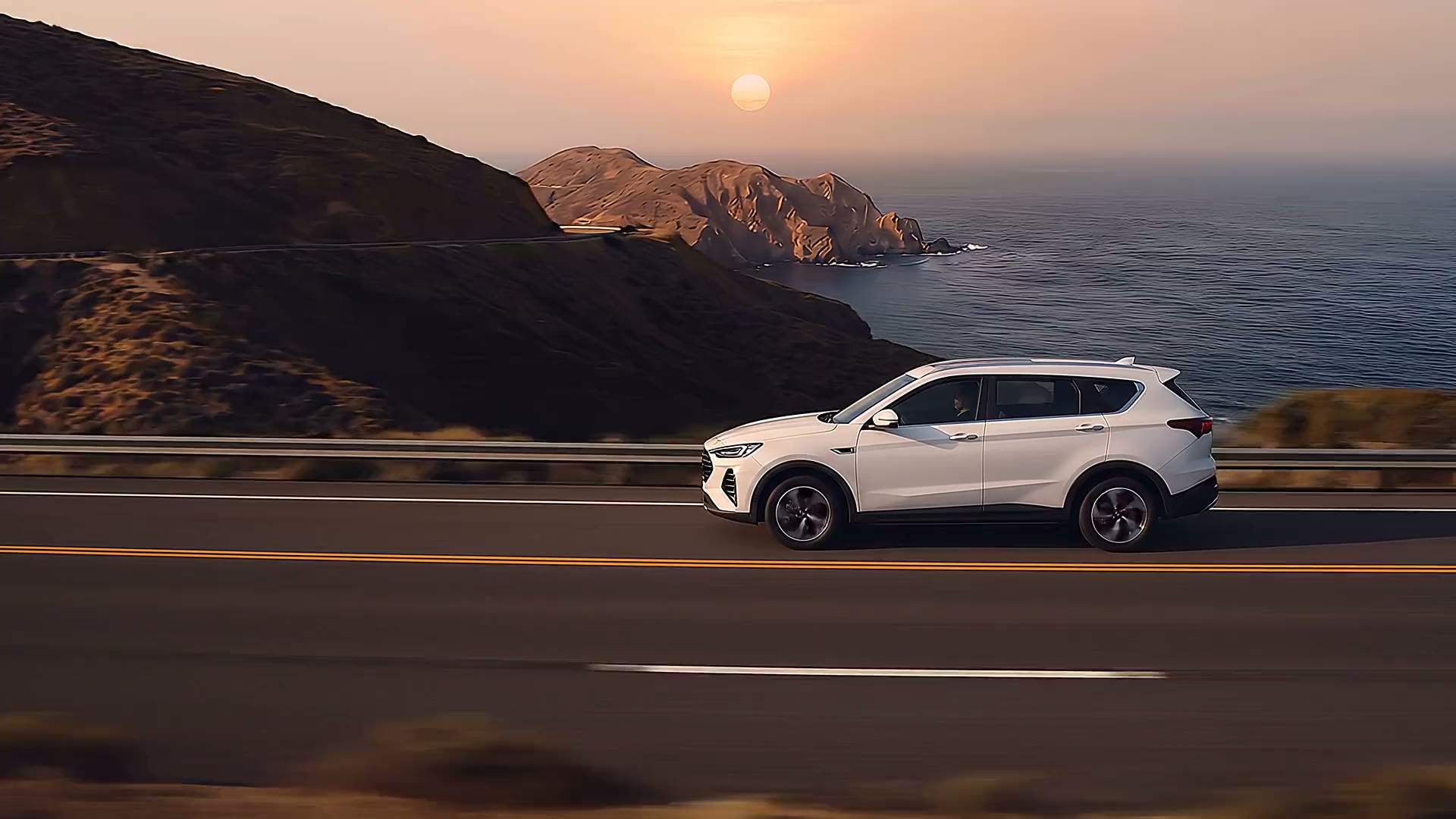 White JAC Sei4 Pro on a coastal road in Baja California at sunset.